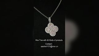 Elegancki naszyjnik ze srebra próby 925 z kwiatem szczęścia